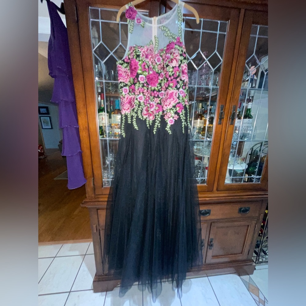 Brand new formal dress with tags size 16 never worn